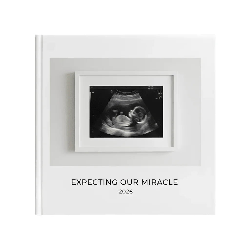 White Pebble photo book cover with baby ultrasound, 'Expecting Our Miracle 2026' text
